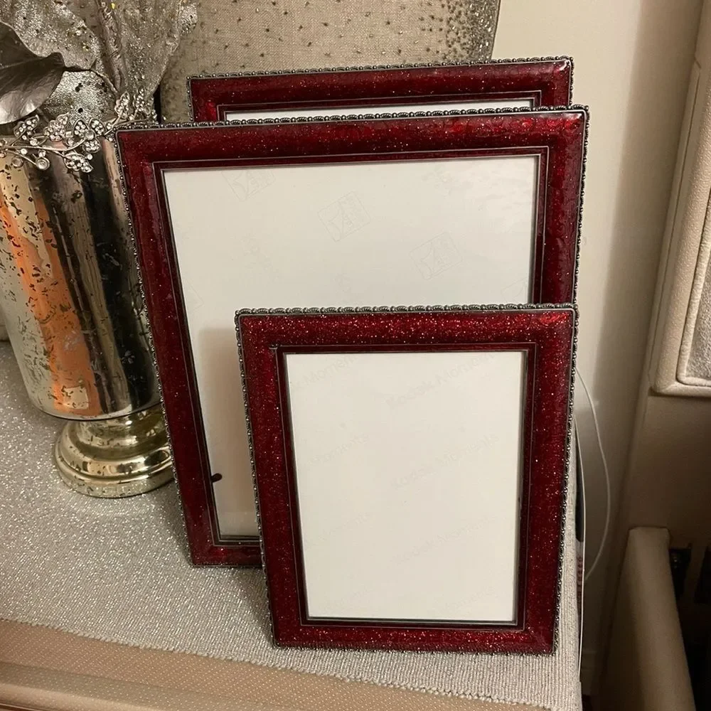 Three burgundy frames